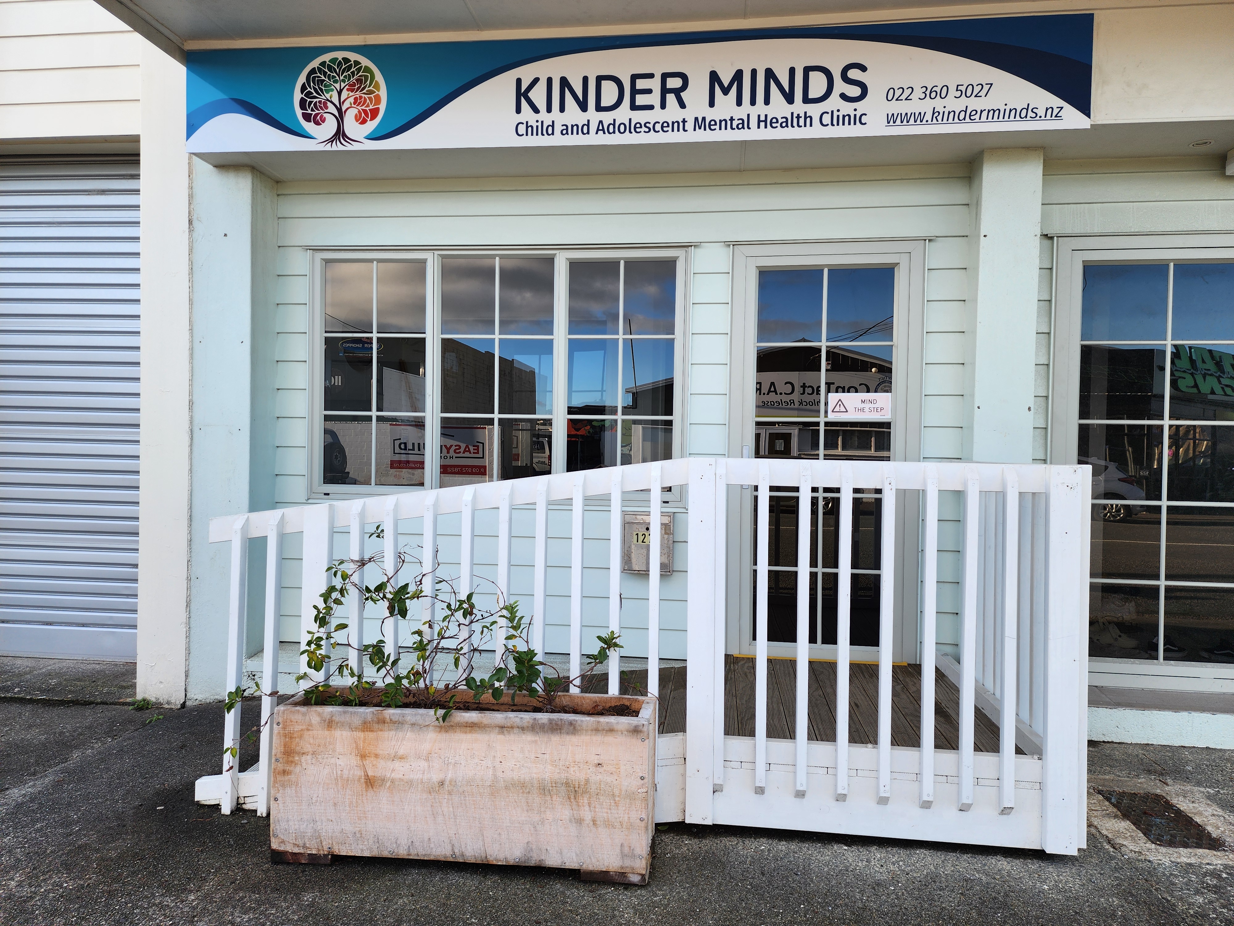 The entrance to the Kinder Minds clinic, seen from the street